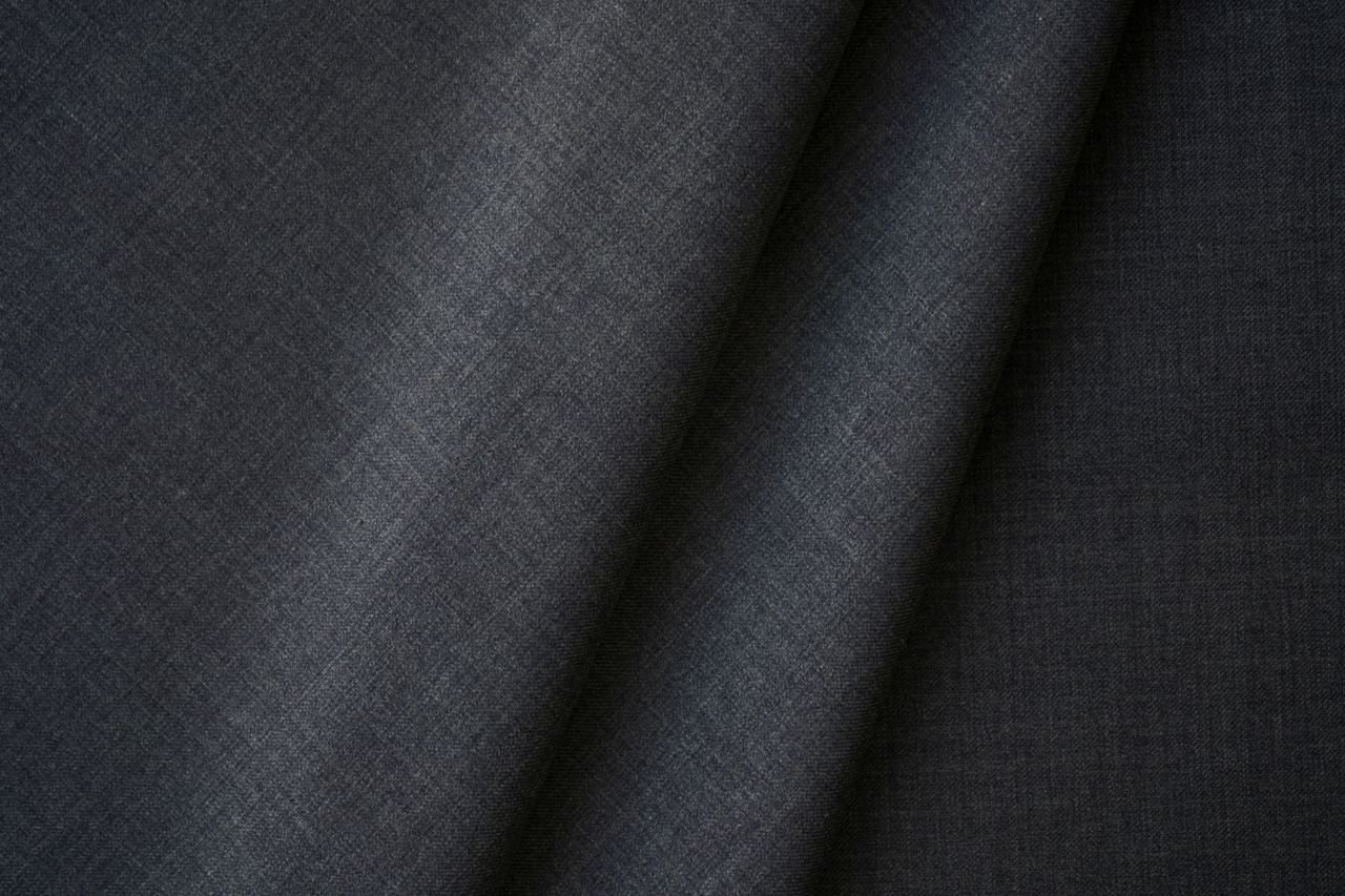 Top view smooth texture of simple elegant gray folded fabric of classic suit